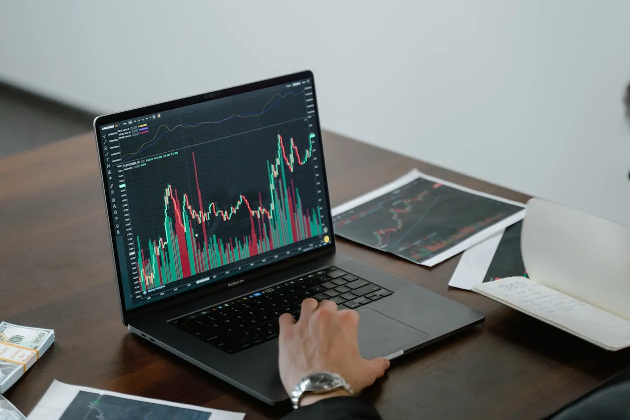 Graph and data analytics displayed on a laptop screen